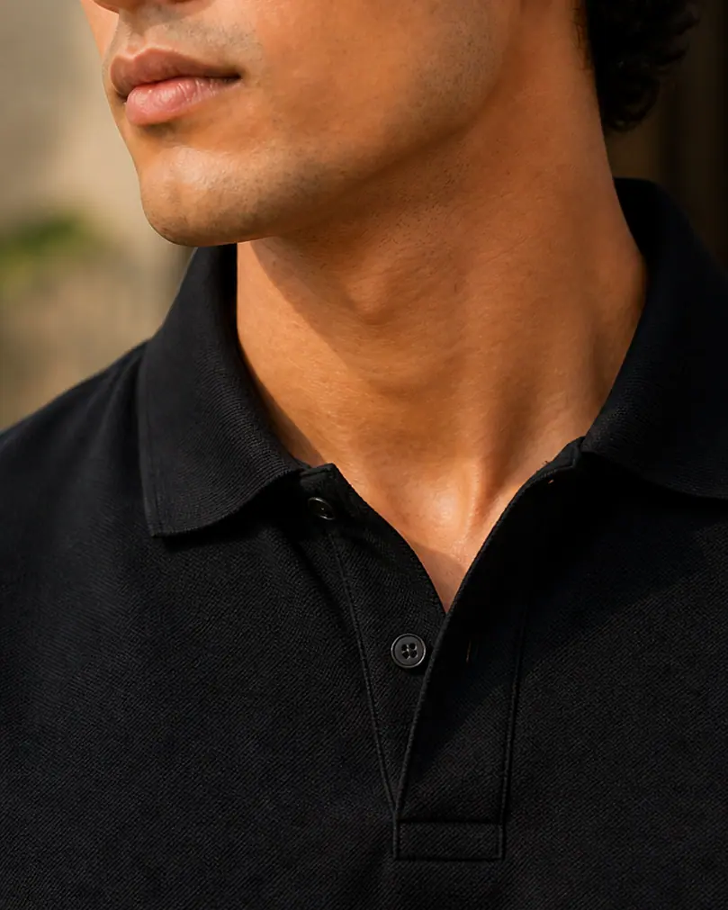 Close-up of The Signature collar and two-button placket in Obsidian